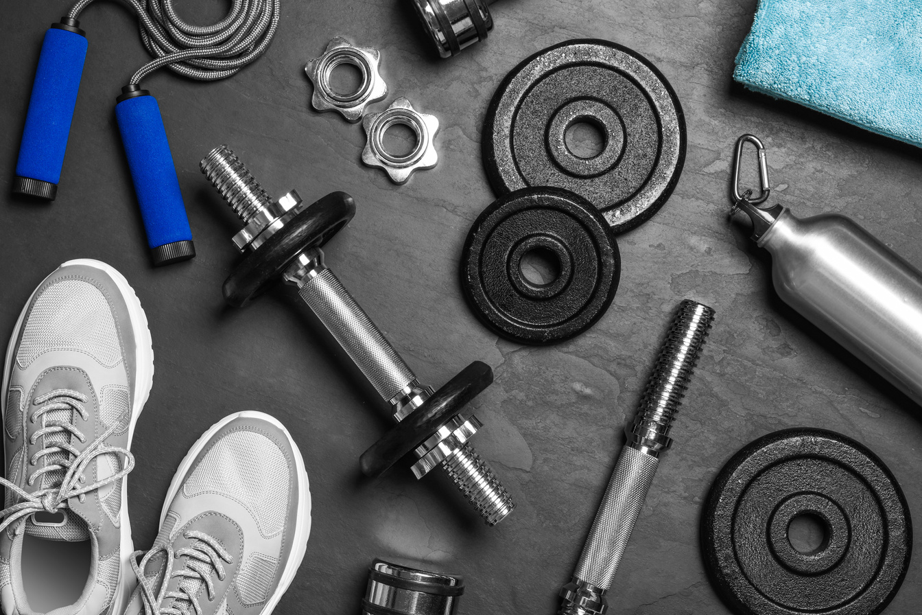 Gym Equipment on Black Background, Flat Lay